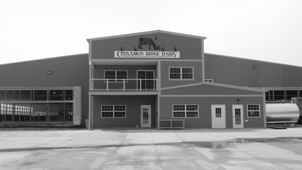 Black and white photo of Cinnamon Ridge Farms main building.